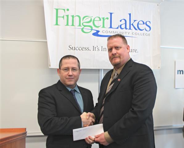 Business Manager Michael Davis (right).